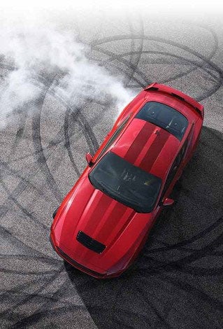 Overhead view of a 2024 Ford Mustang® model with tire tracks on pavement | Soeby Motor Company in Walhalla ND