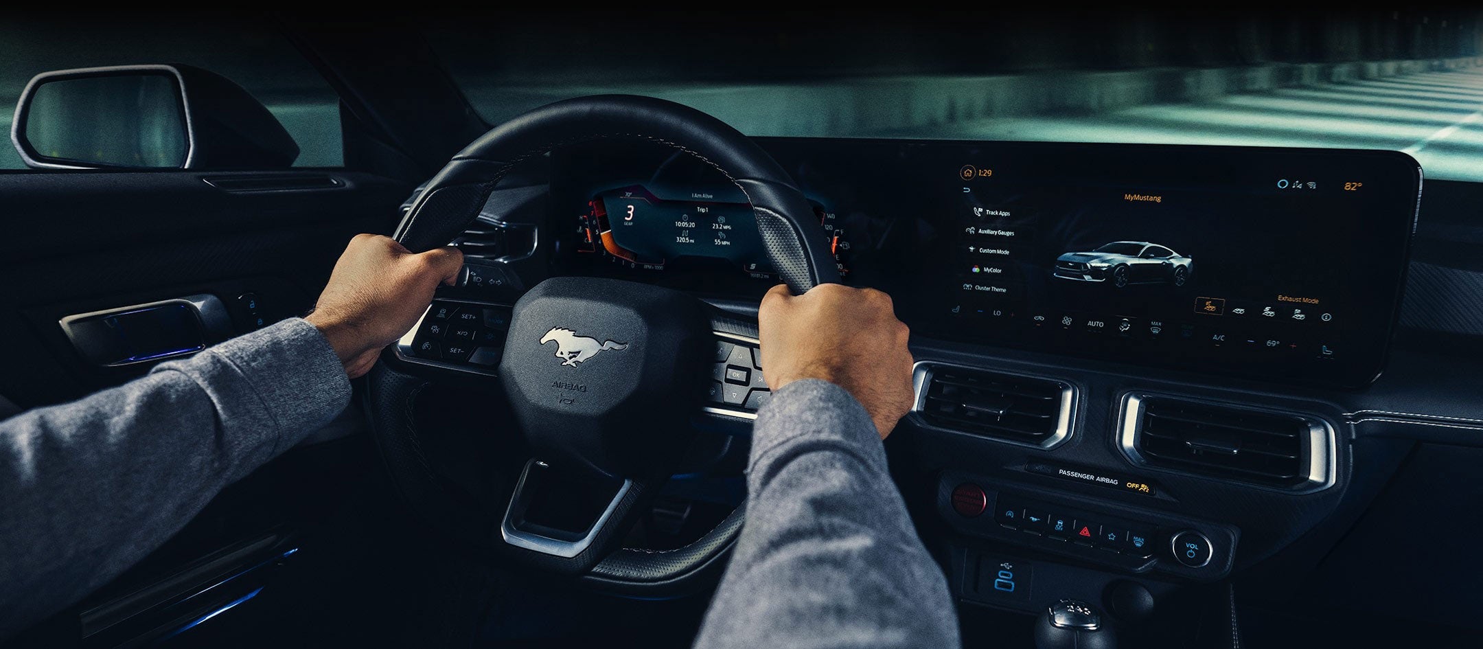A 2024 Ford Mustang® model interior with a person driving | Soeby Motor Company in Walhalla ND