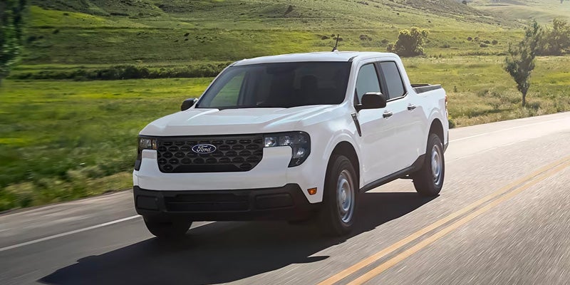 2025 Ford Maverick driving countryside